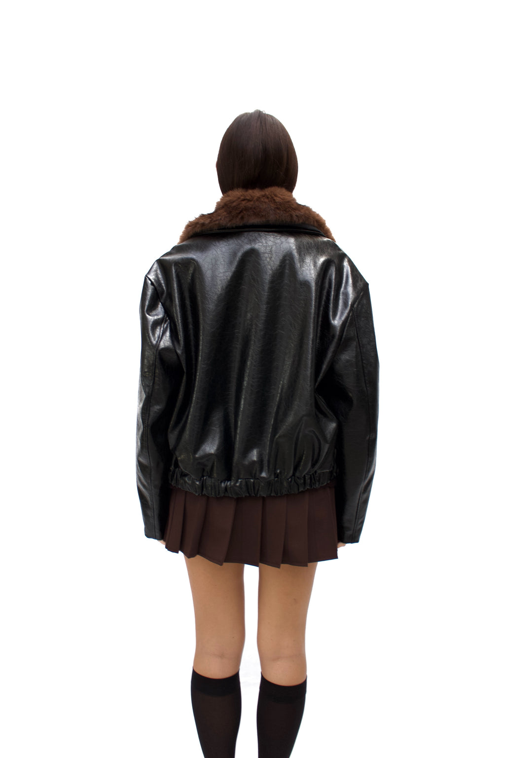 Bomber in ecopelle martellata