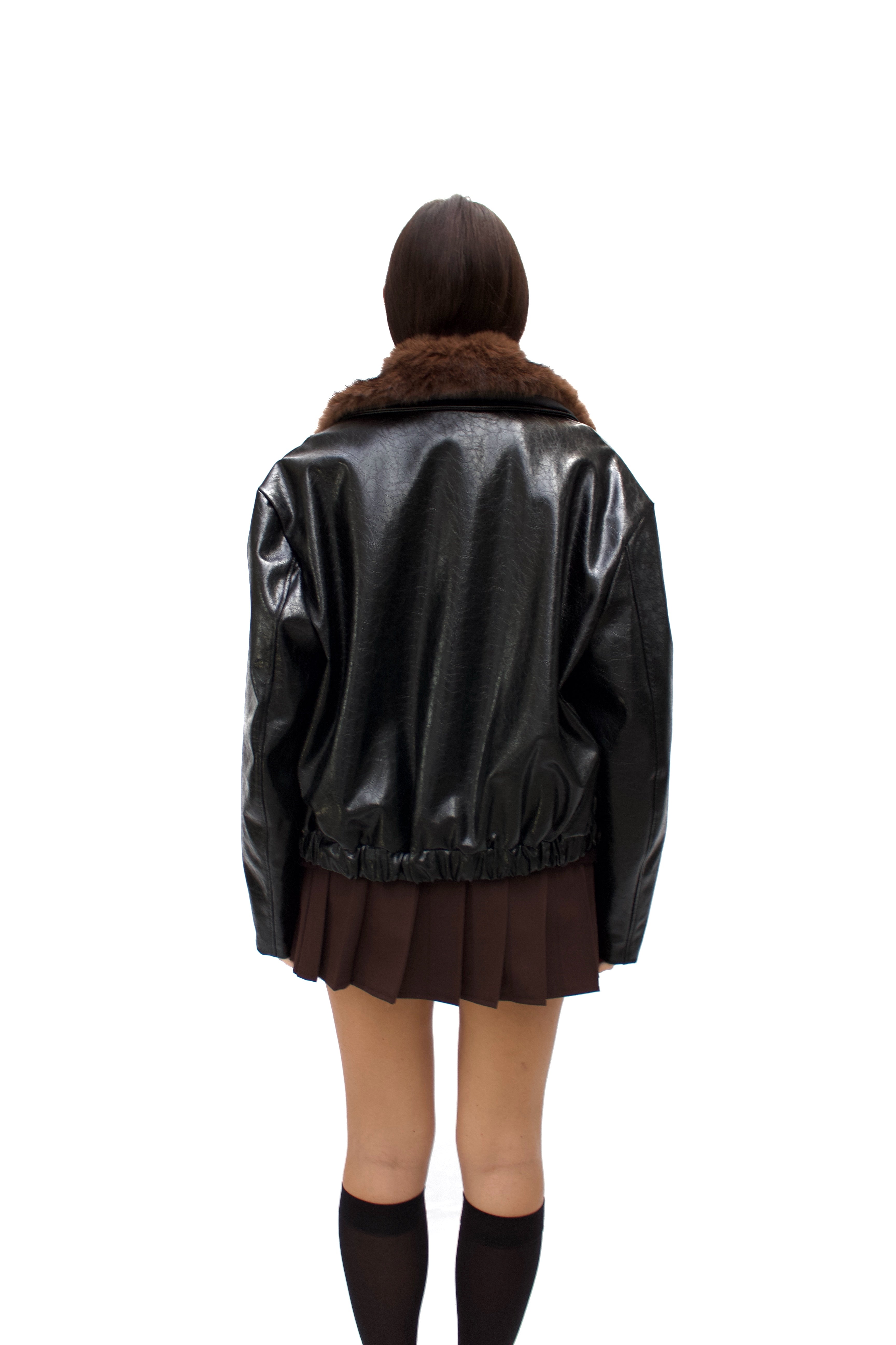 Bomber in ecopelle martellata